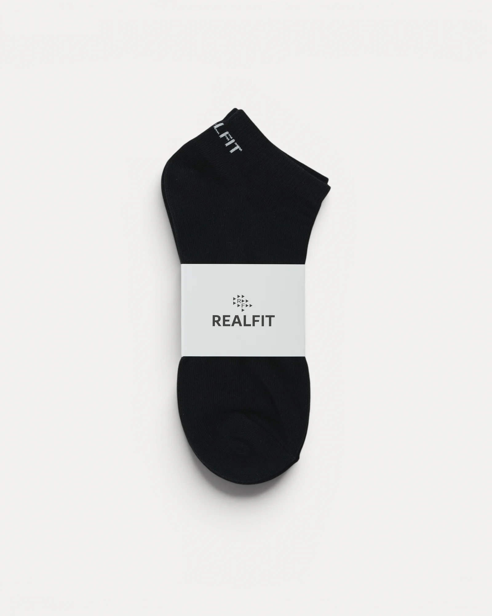 Realfit Ankle Socks in Midnight Black with retail packaging