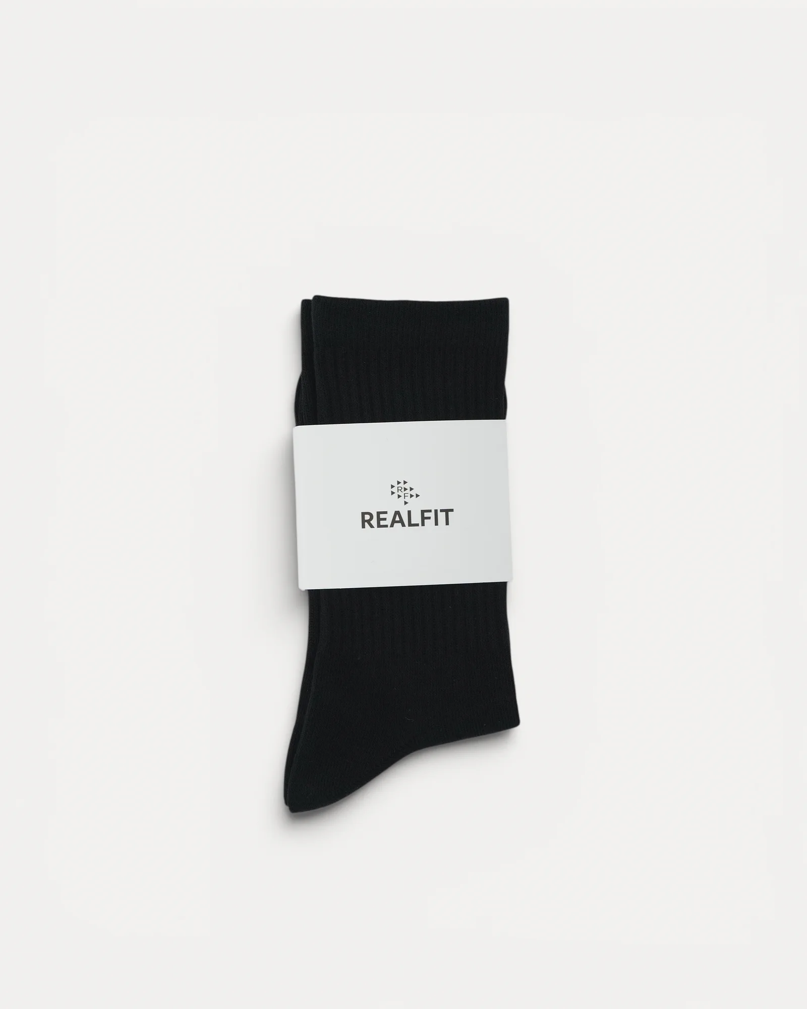 Realfit Crew Socks in Midnight Black with retail packaging