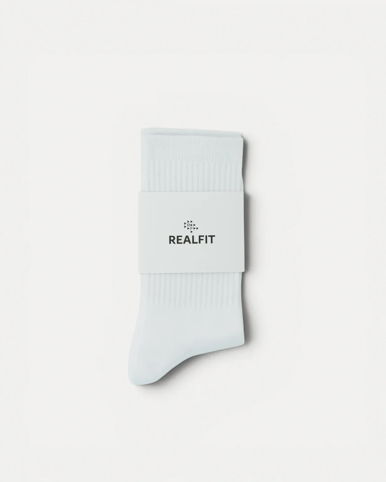 Realfit Crew Socks in Optic White with retail packaging