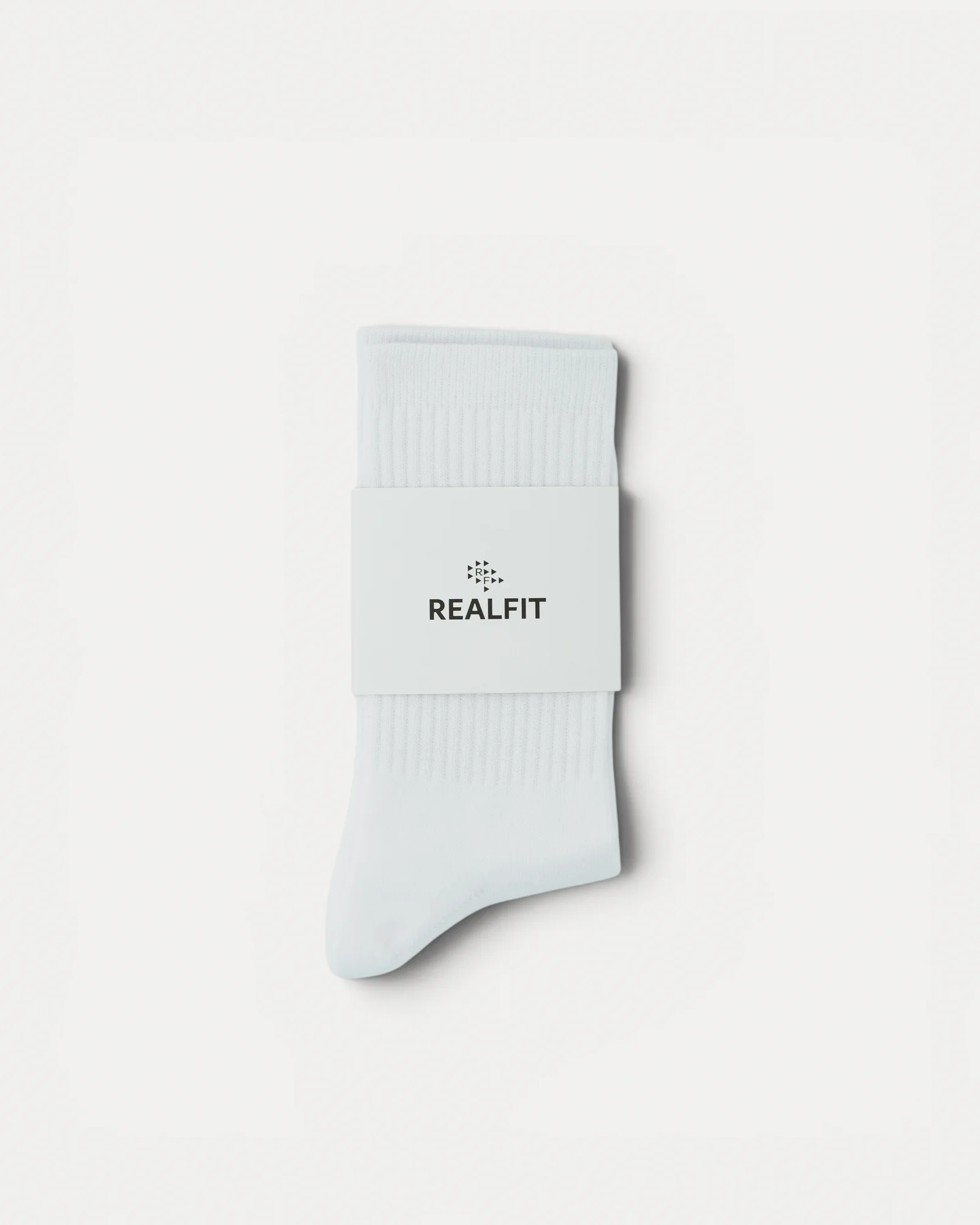 Realfit Crew Socks in Optic White with retail packaging