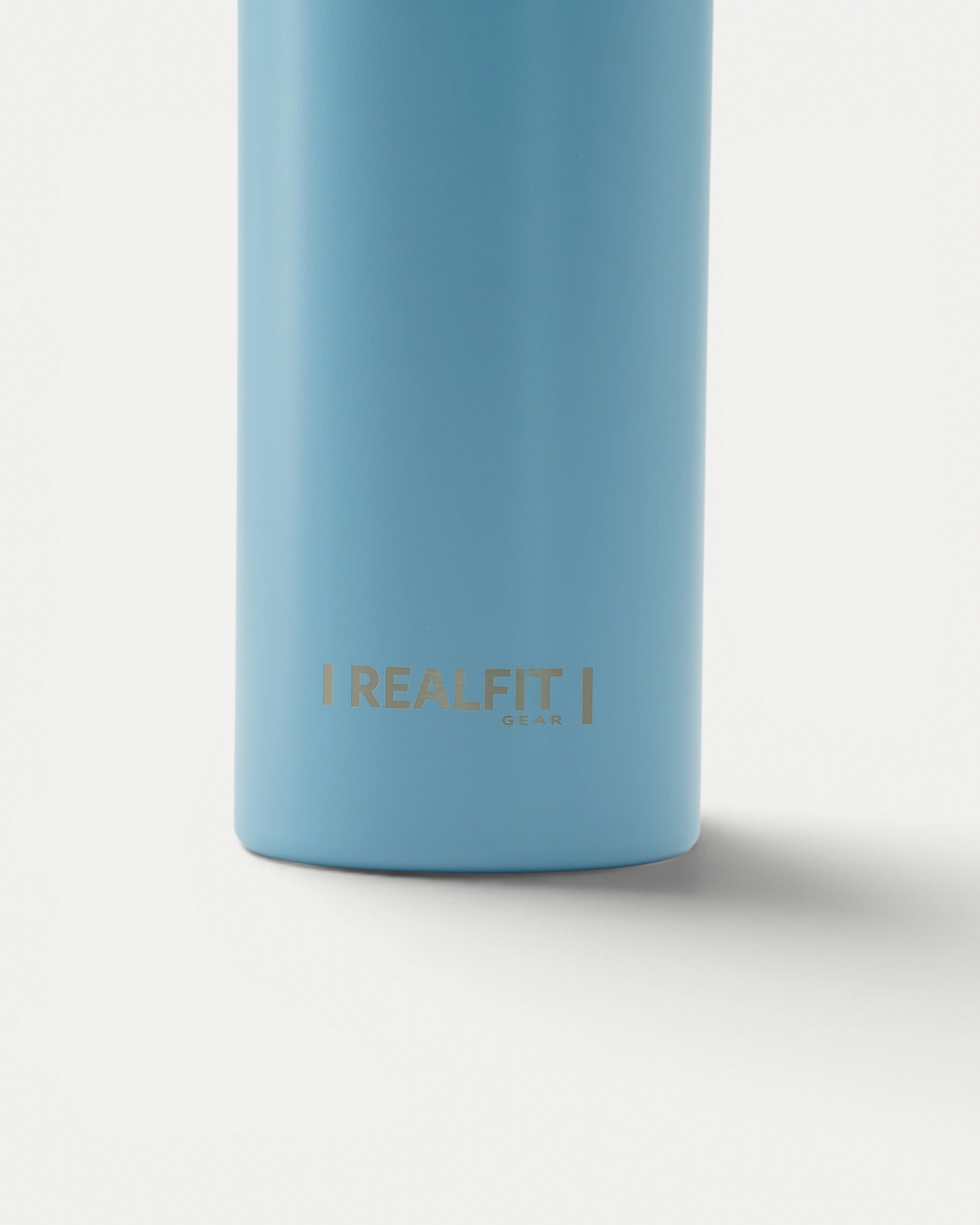 Close-up rear view of Realfit Glacier Blue stainless steel water bottle