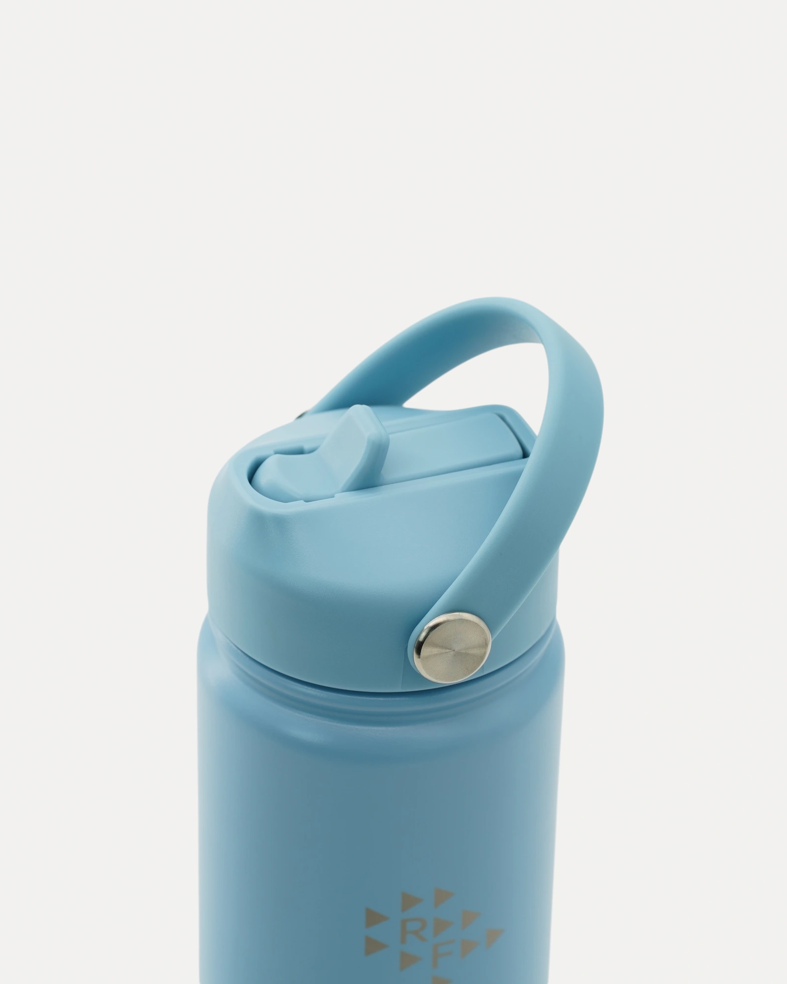 Realfit Glacier Blue water bottle with flip straw lid closed