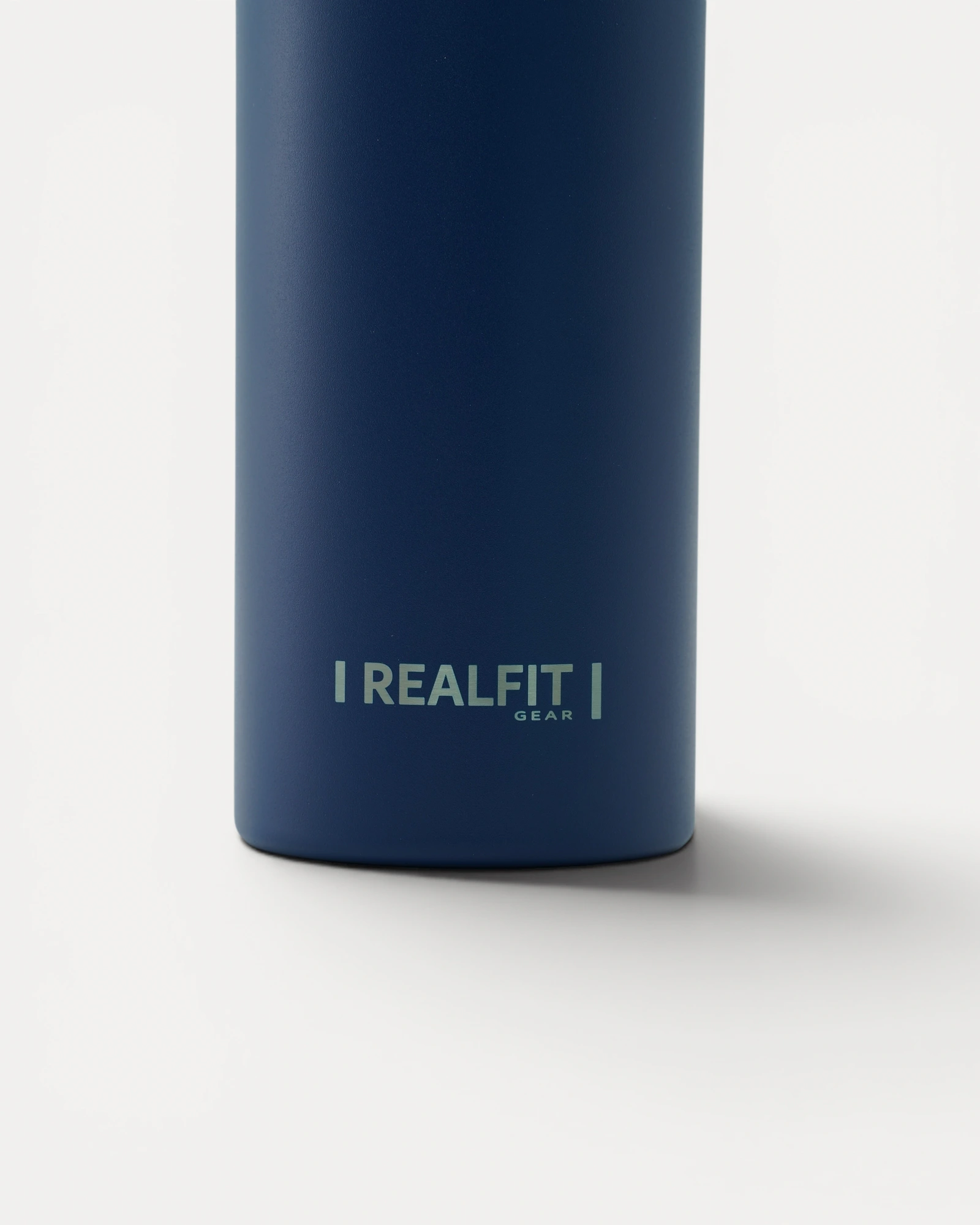Close-up rear view of Realfit Midnight Navy stainless steel water bottle