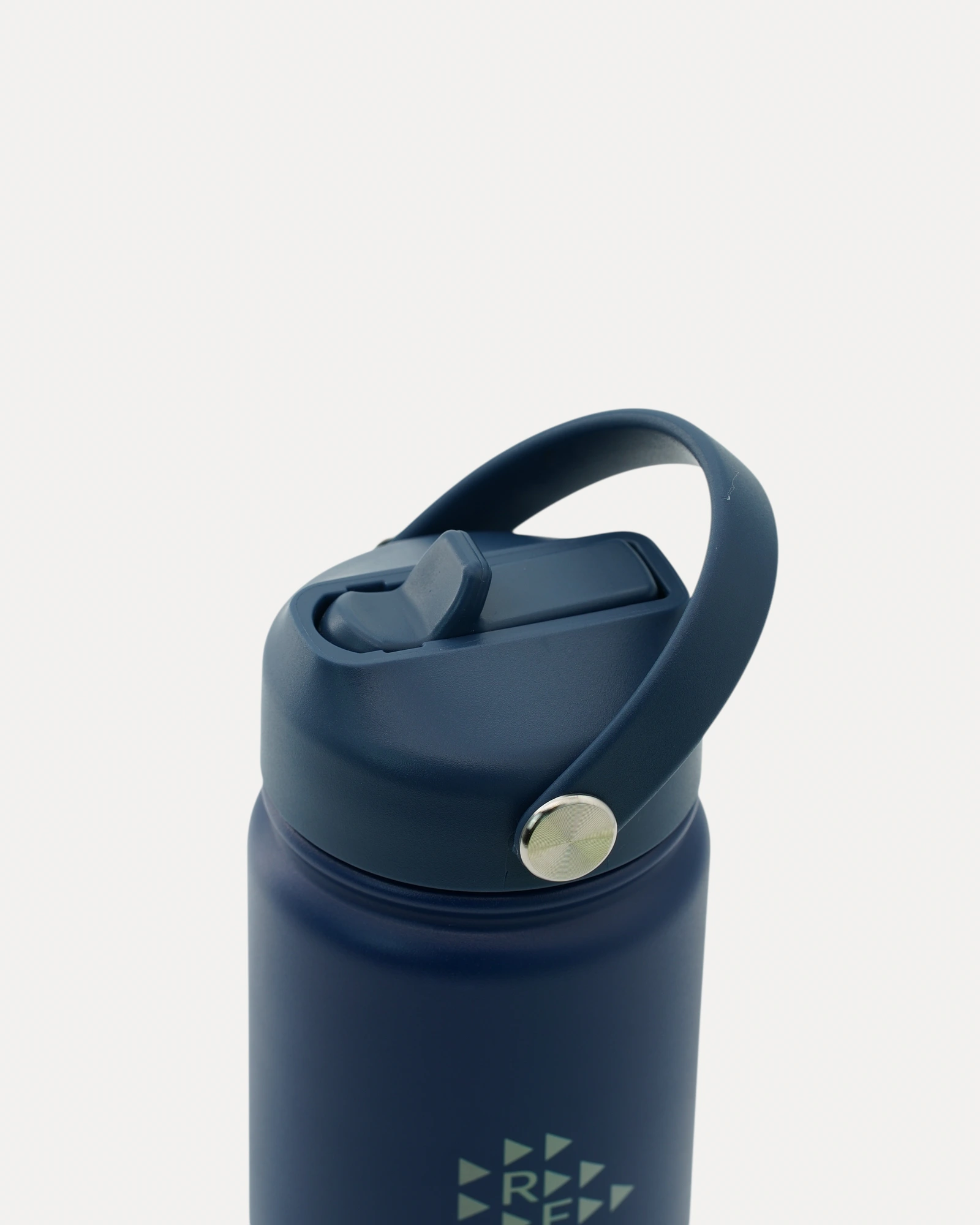 Realfit Midnight Navy water bottle with flip straw lid closed