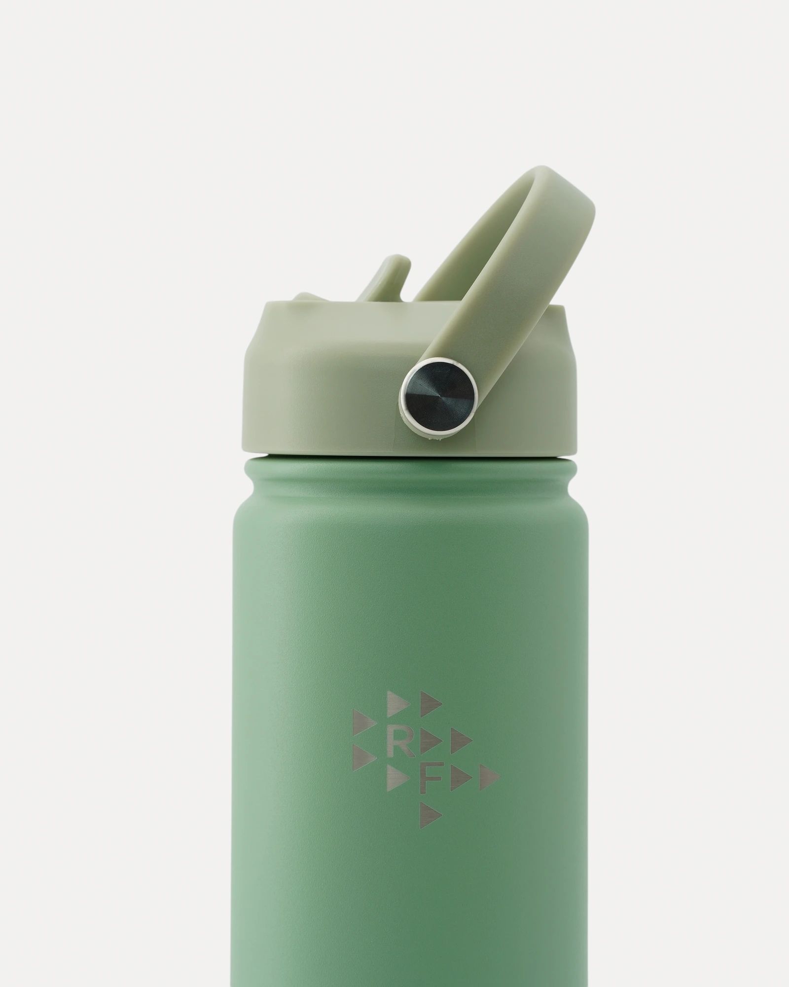 Close-up front view of Realfit Soft Mint stainless steel water bottle with Realfit logo