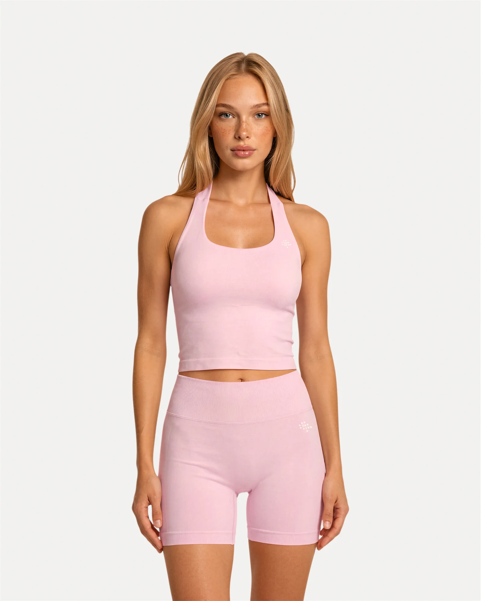 Front view of soft pink Realfit Core Halter Tank top for women