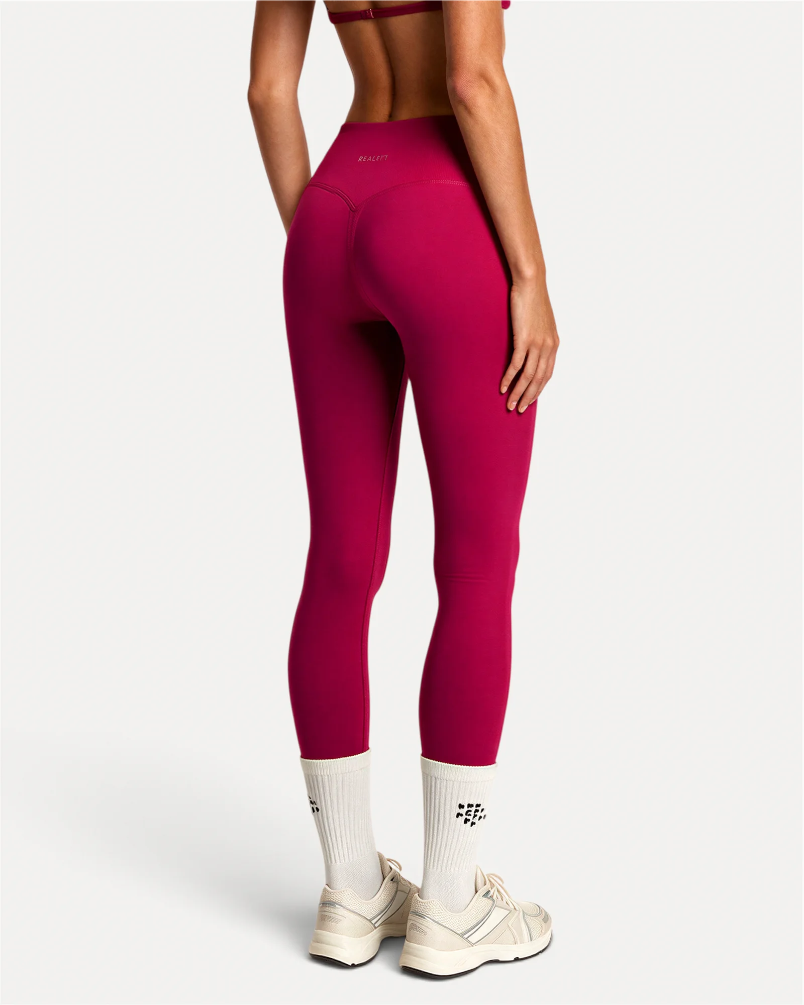 Back close view of crimson Realfit core leggings for women