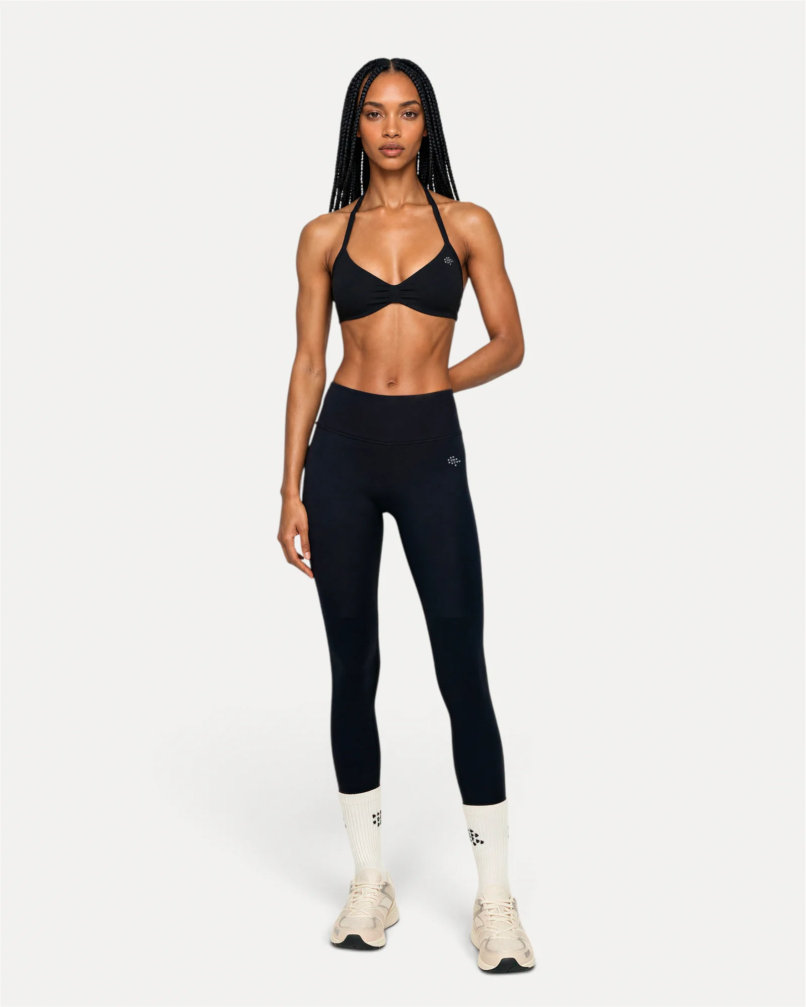 Front lifestyle view of midnight black Realfit core leggings for women