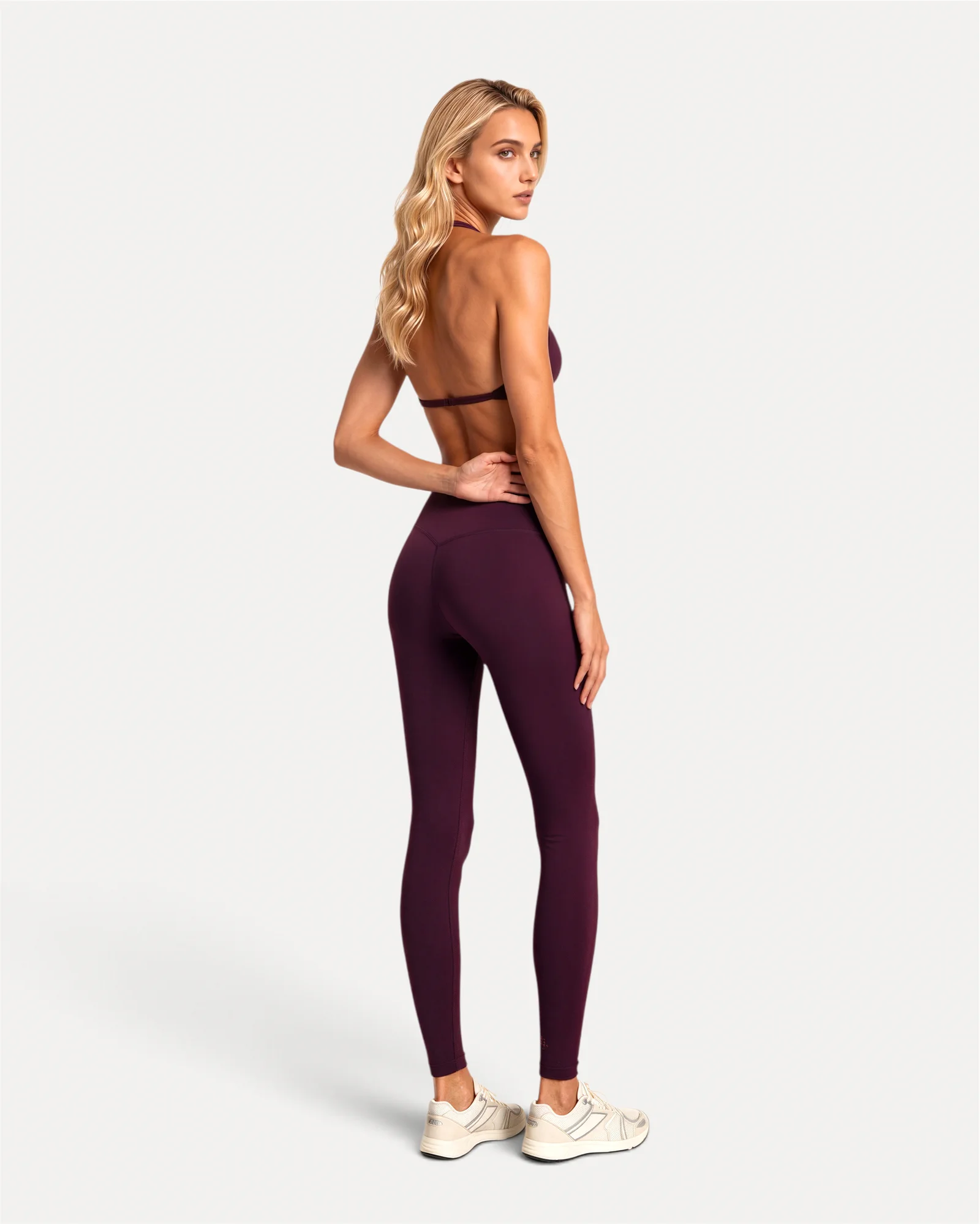 Back lifestyle view of mulberry Realfit core leggings for women