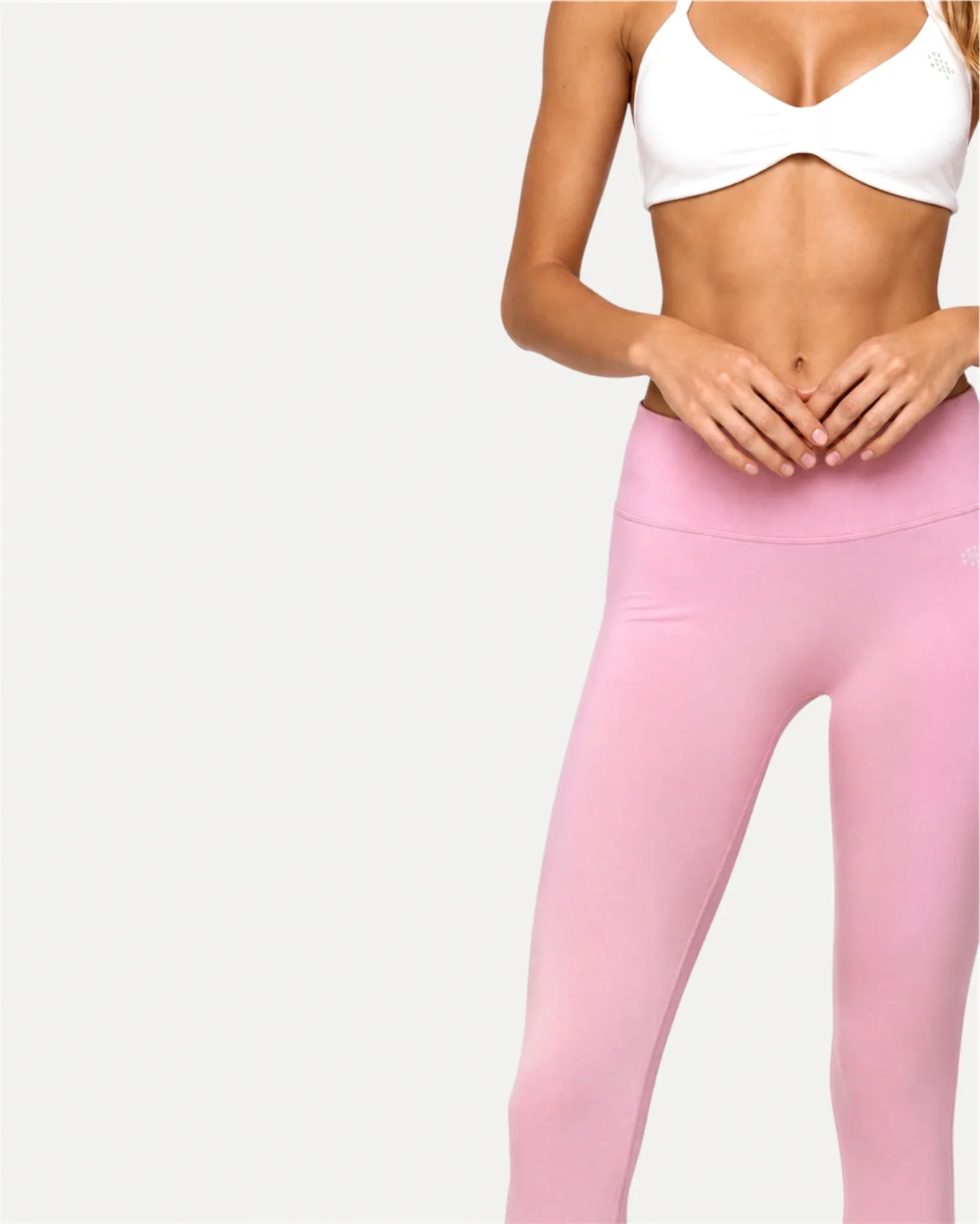 Front mid view of soft pink Realfit core leggings for women