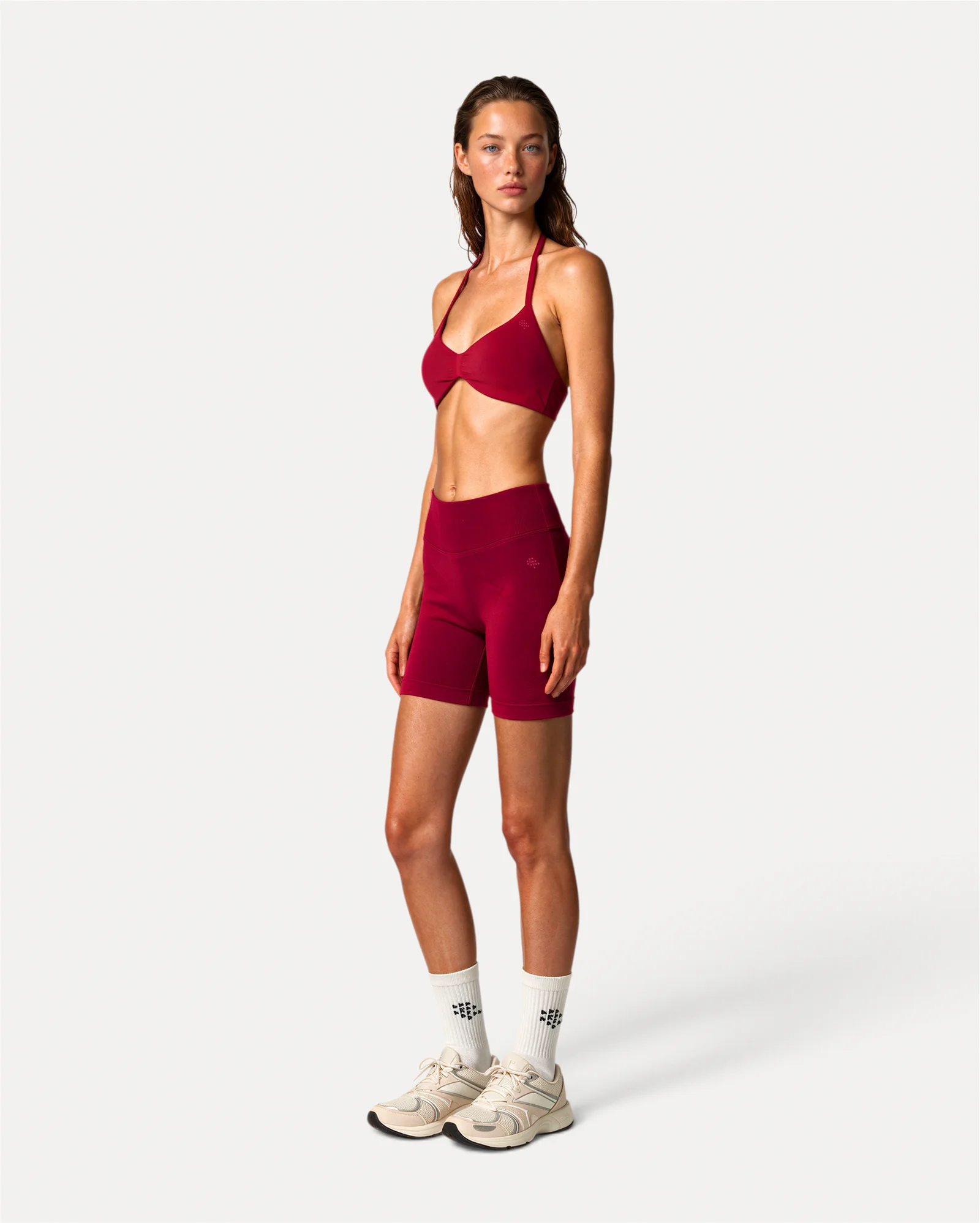 Front lifestyle view of crimson Realfit ruched bra for women