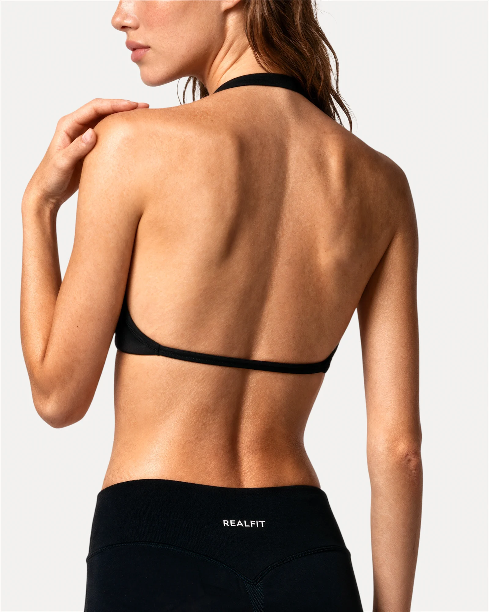 Back close view of midnight black Realfit ruched bra for women