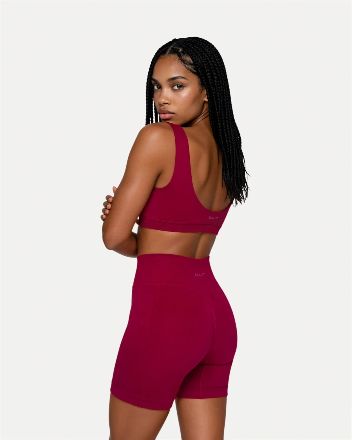 Back angled view of crimson Realfit scoop bra for women