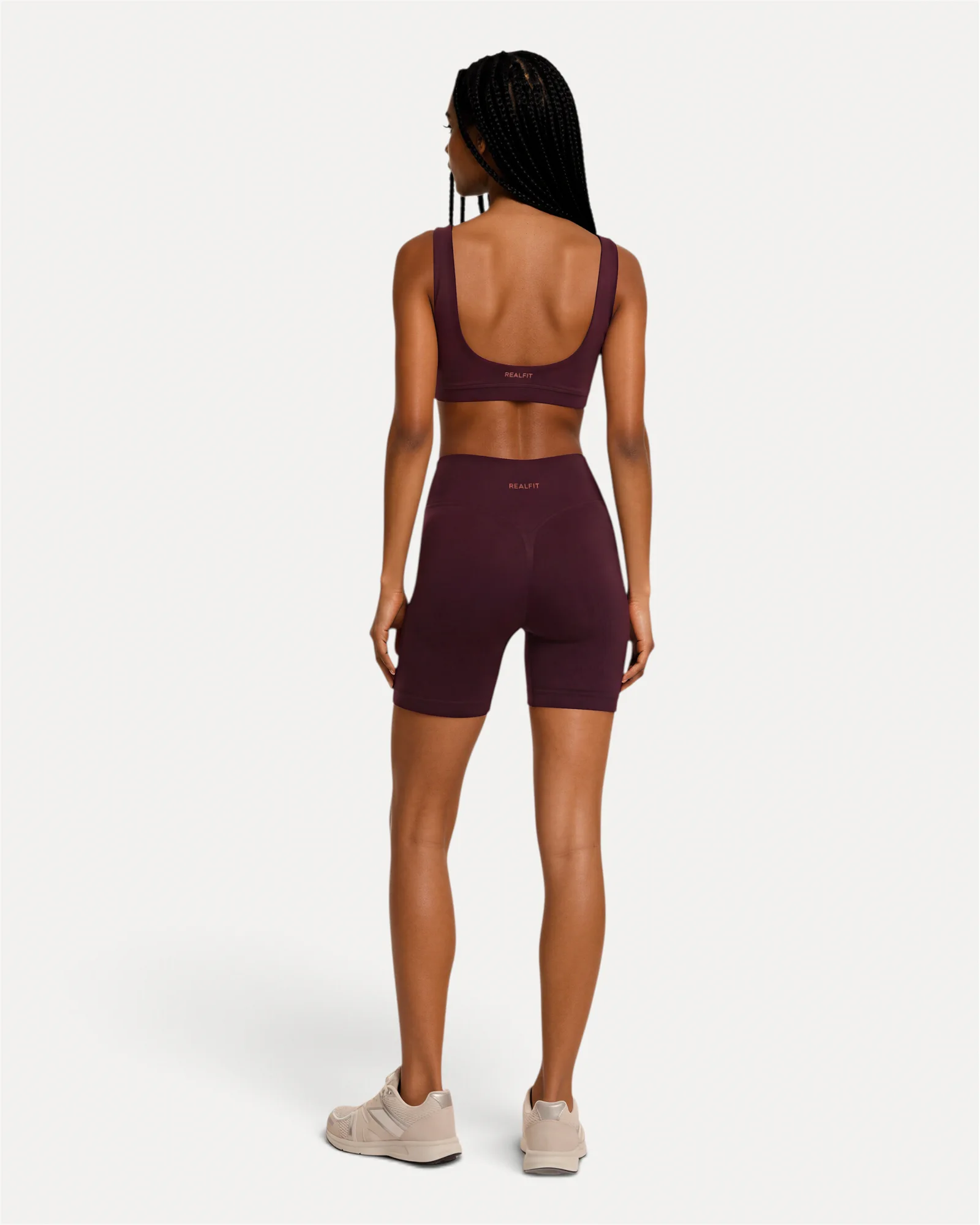 Back lifestyle view of mulberry Realfit scoop bra for women