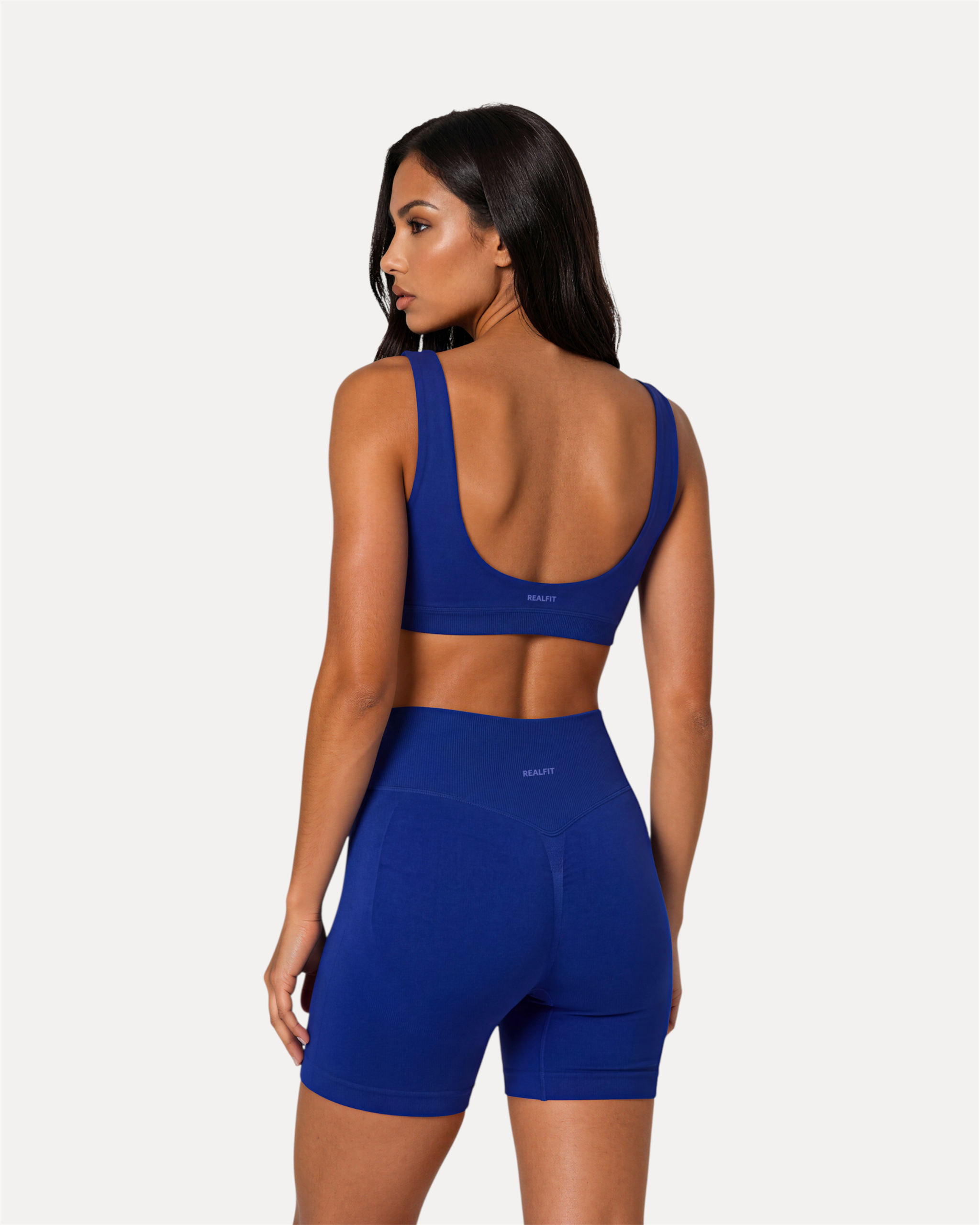Back view of deep blue Realfit core shorts for women