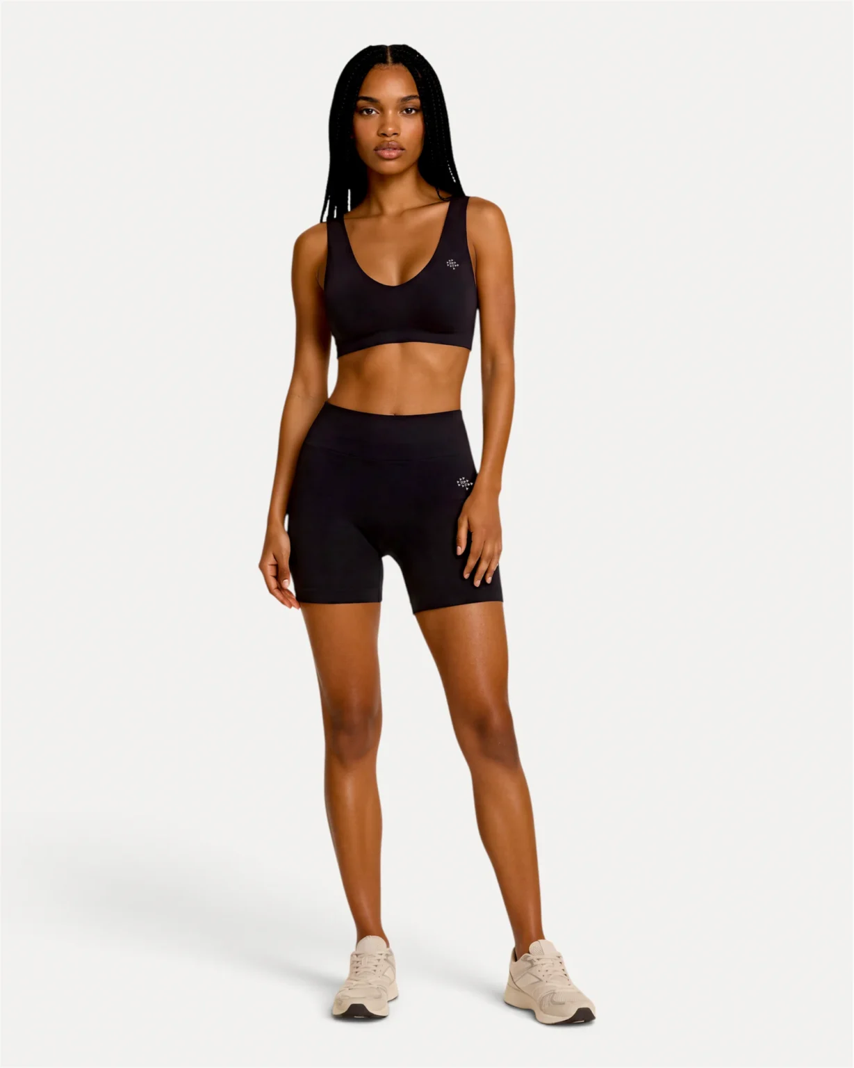 Front lifestyle view of midnight black Realfit core shorts for women