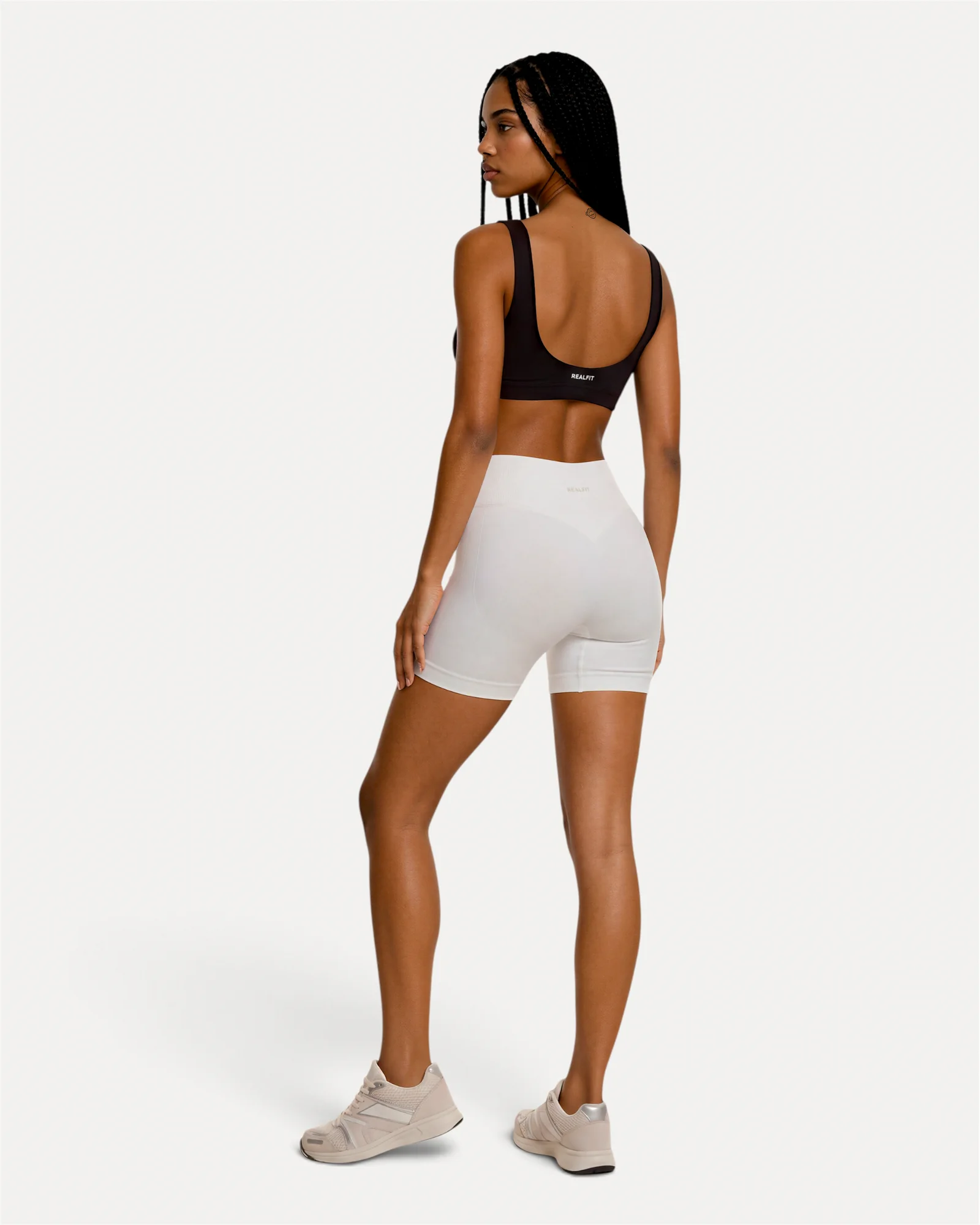 Back view of optic white Realfit core shorts for women