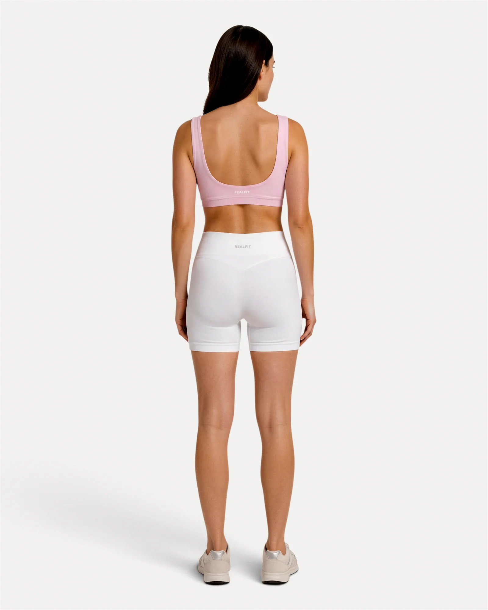 Back view of optic white Realfit core shorts for women