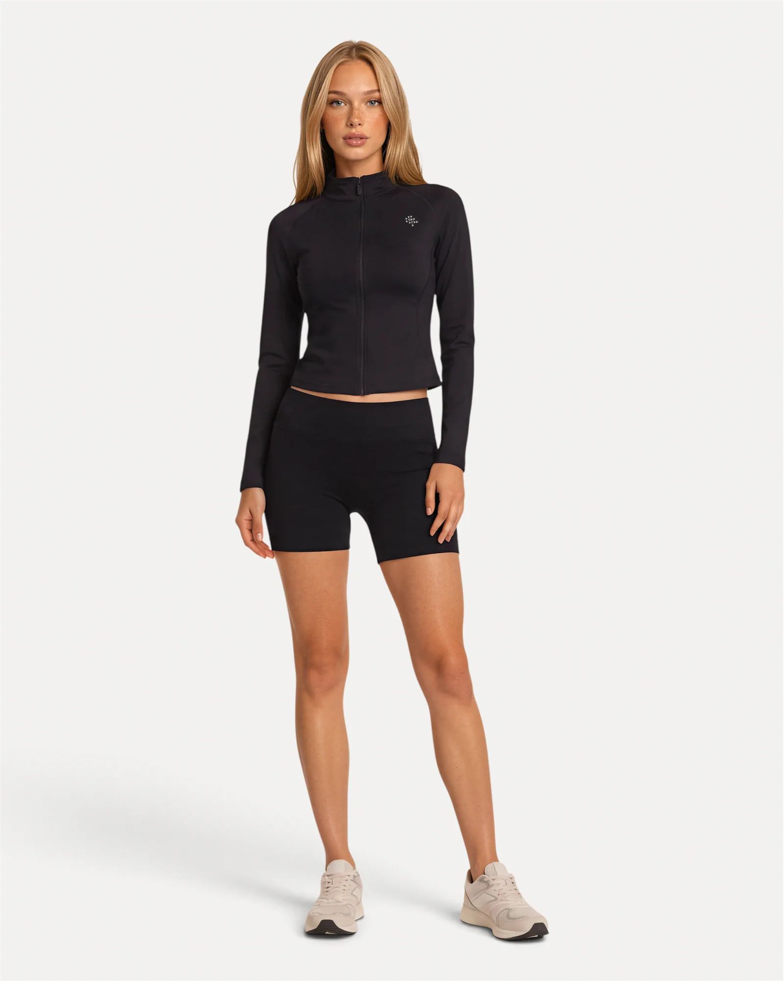 Front lifestyle view of midnight black Realfit lightweight zip jacket for women