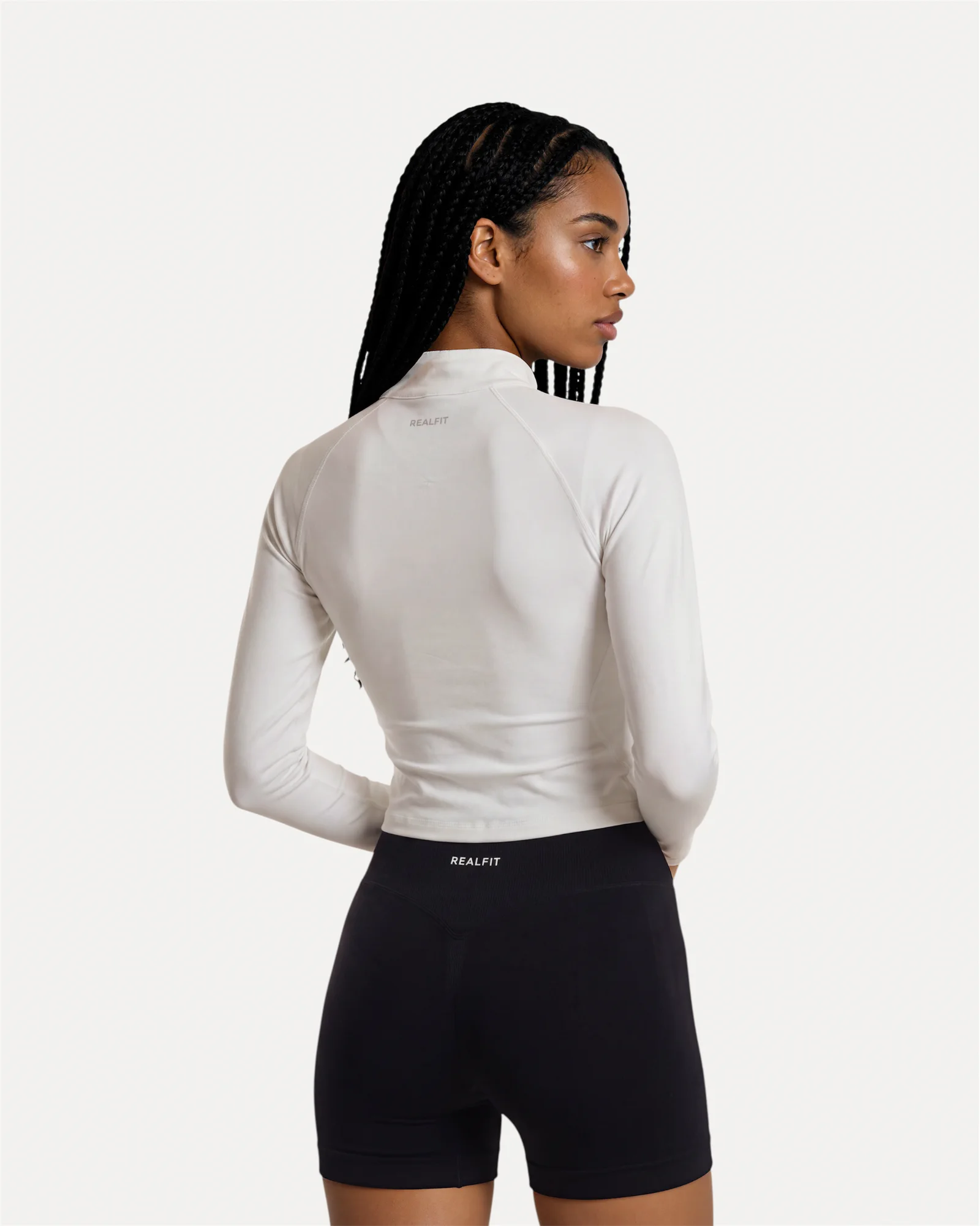 Back view of optic white Realfit lightweight zip jacket for women