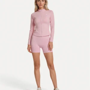 Front lifestyle view of soft pink Realfit lightweight zip jacket for women