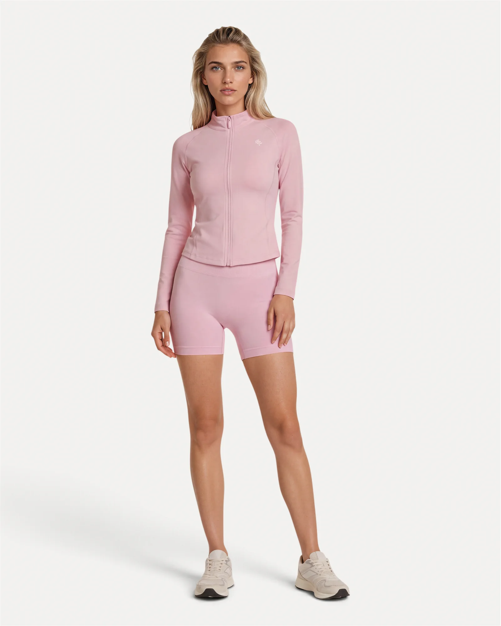 Front lifestyle view of soft pink Realfit lightweight zip jacket for women
