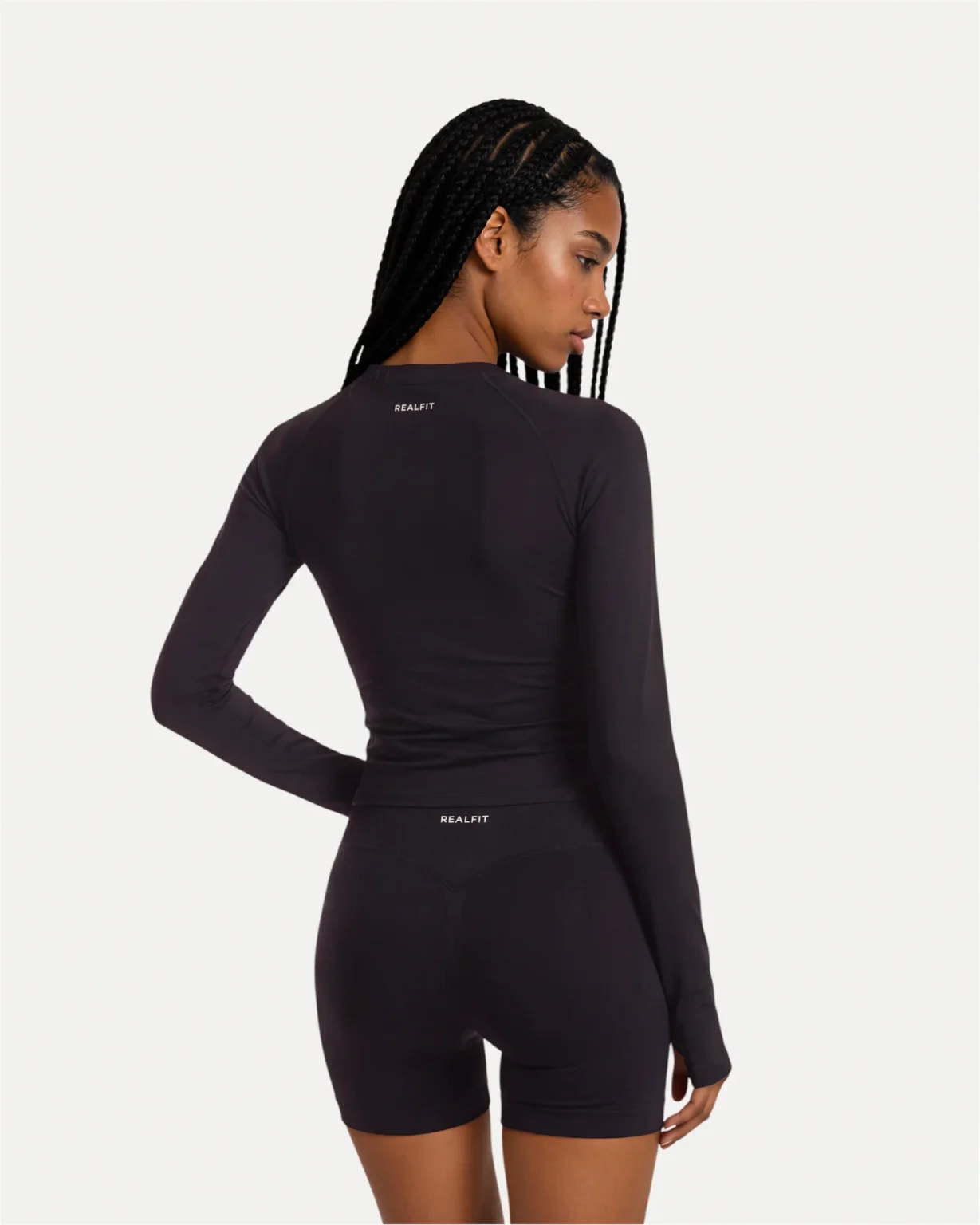 Back view of midnight black Realfit long sleeve top for women