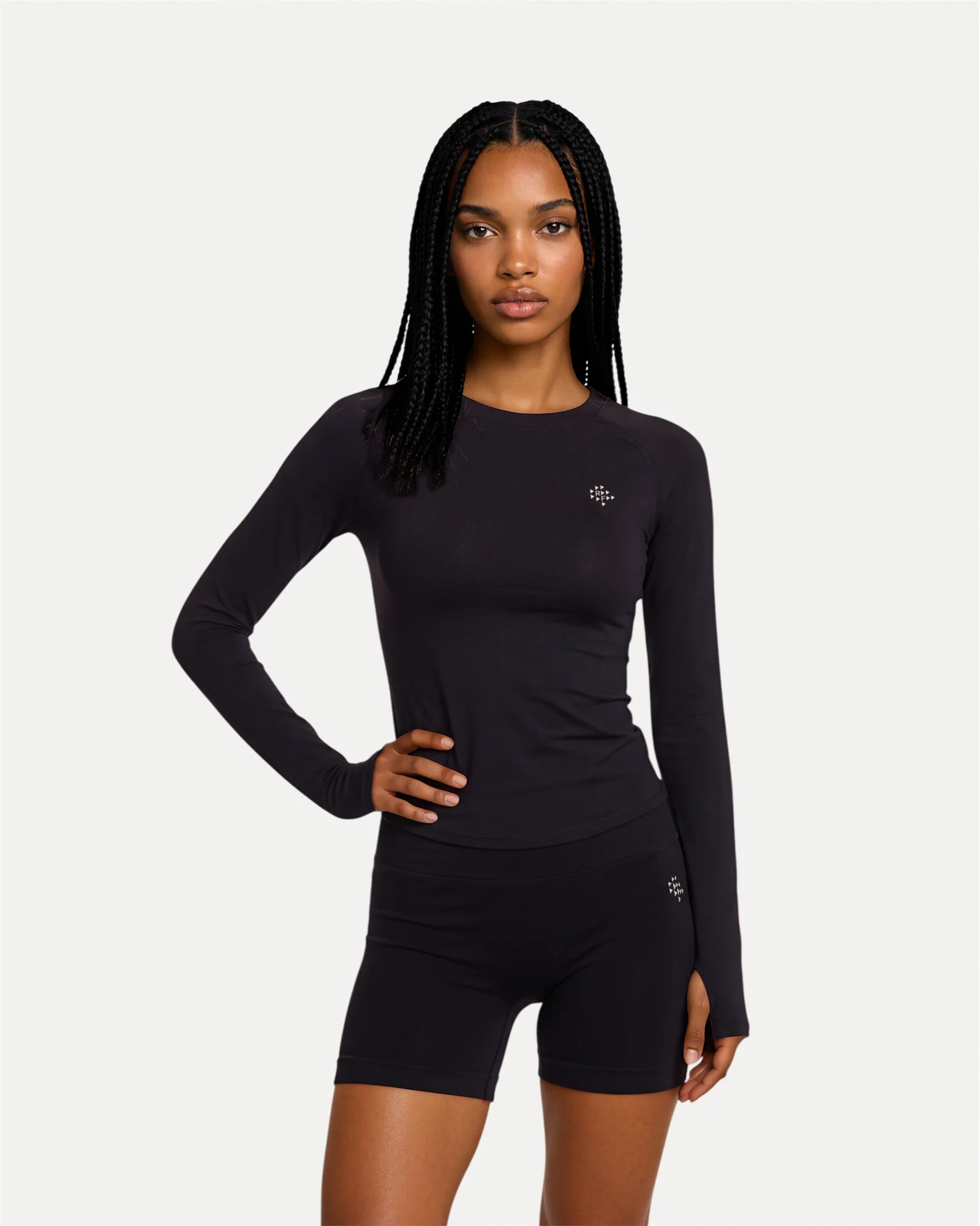 Front view of midnight black Realfit long sleeve top for women