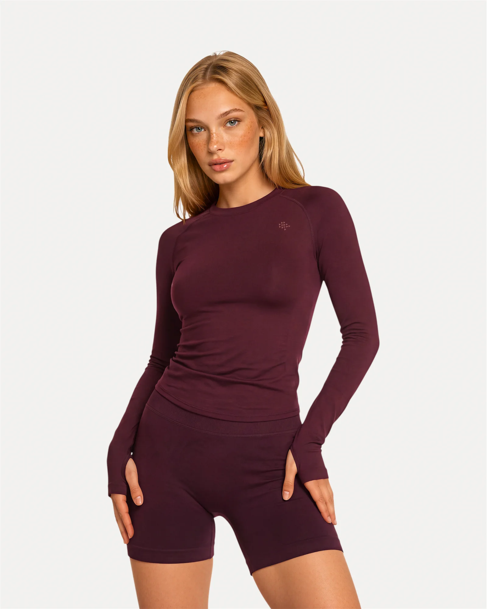 Front angled view of mulberry Realfit long sleeve top for women