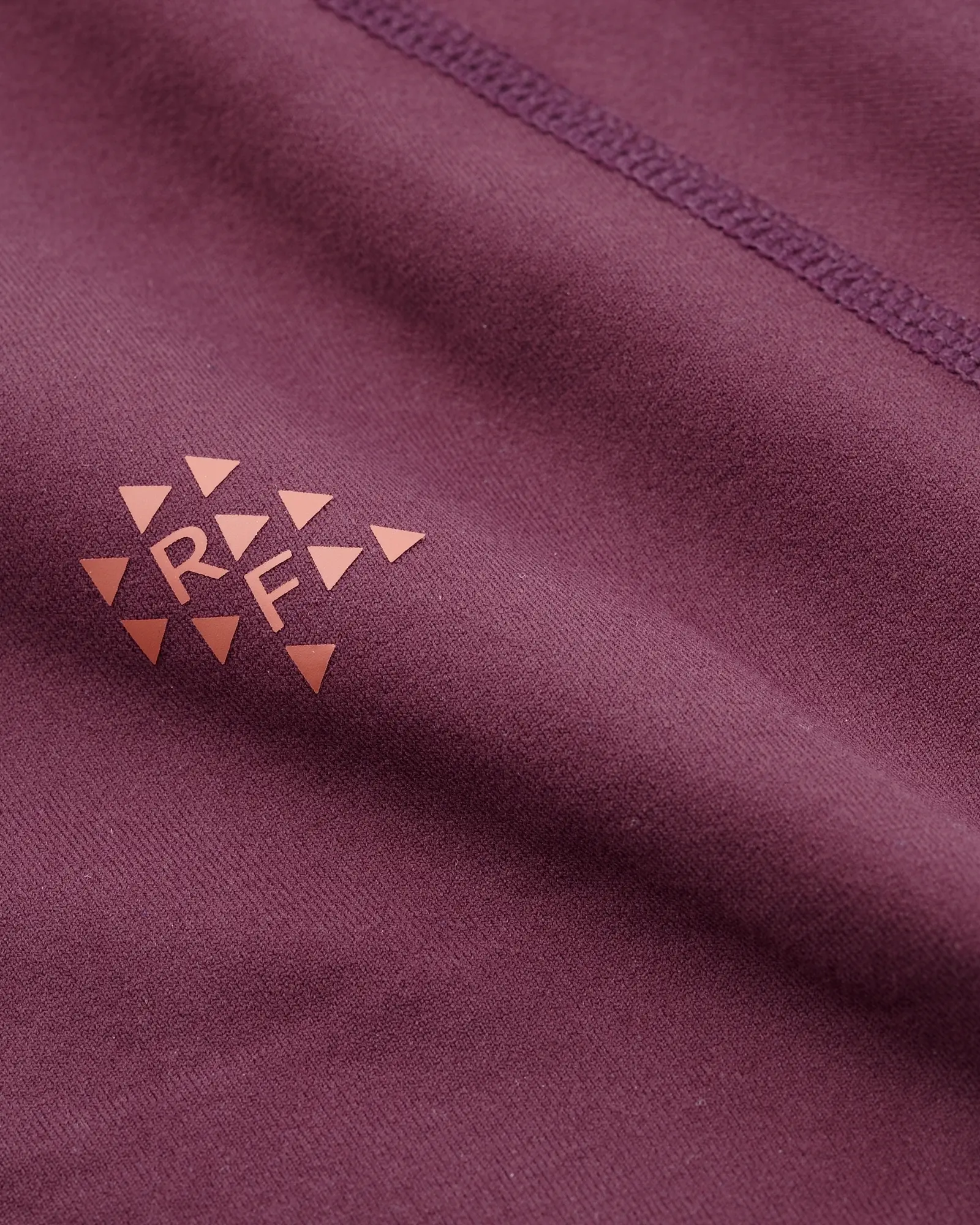 Logo and fabric close-up view of mulberry Realfit long sleeve top for women