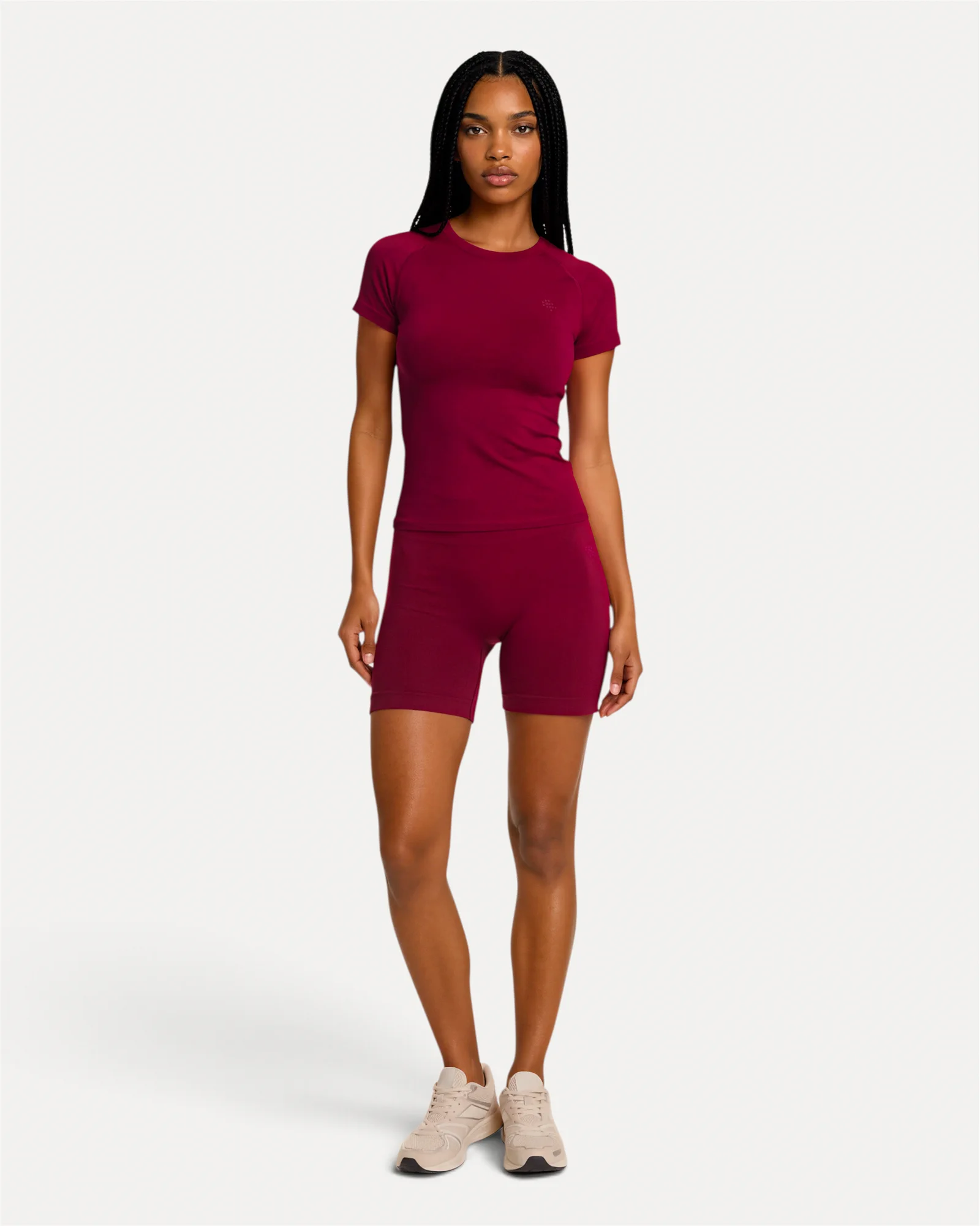 Front lifestyle view of crimson Realfit short-sleeve top for women
