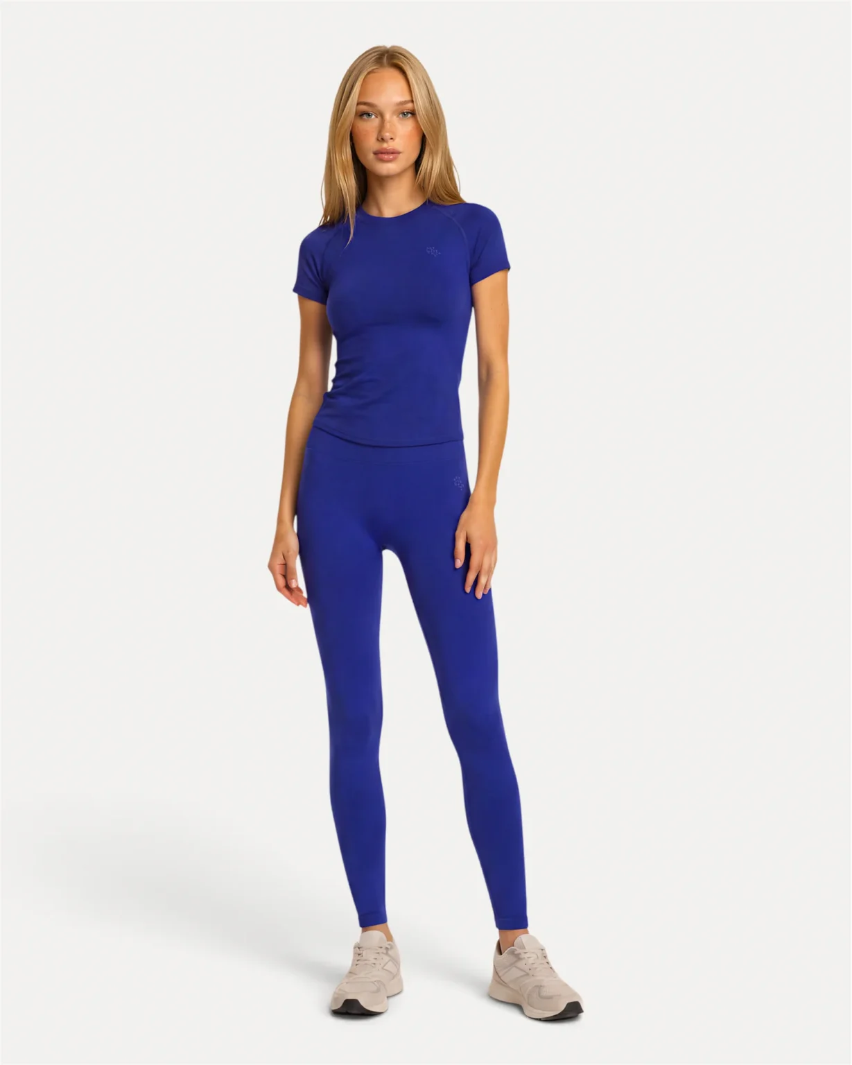 Front lifestyle view of deep blue Realfit short-sleeve top for women