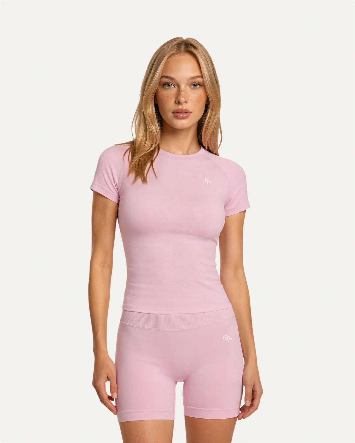 Front view of soft pink Realfit Core short-sleeve top for women