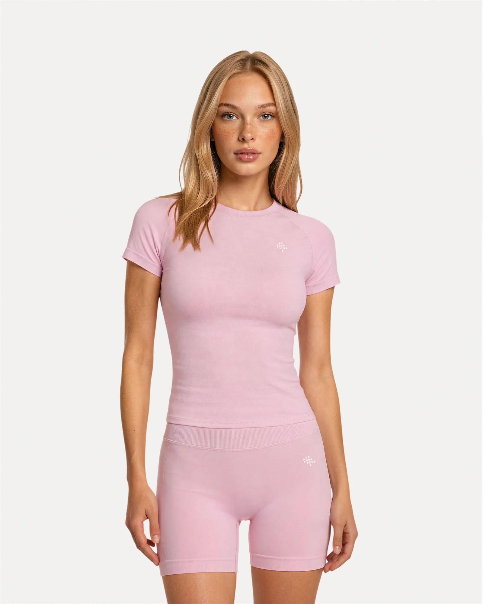 Front view of soft pink Realfit Core short-sleeve top for women
